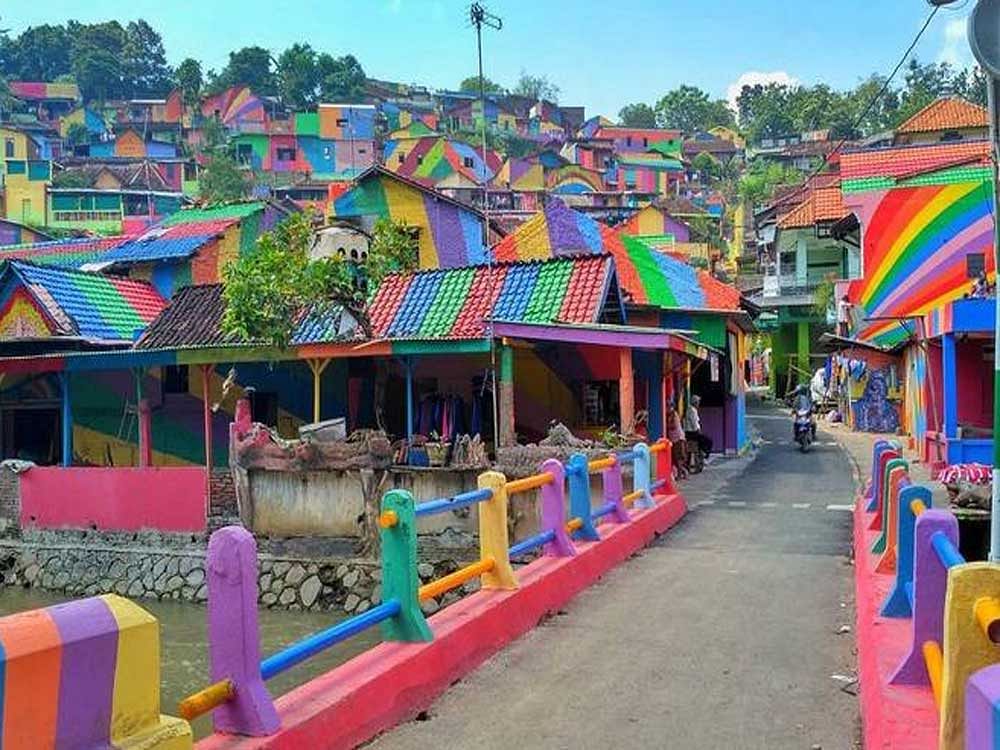 The houses were re-painted in a dizzying array of colours during a month-long overhaul which cost about USD 200,000, and the polluted river nearby was also cleaned up. Twitter