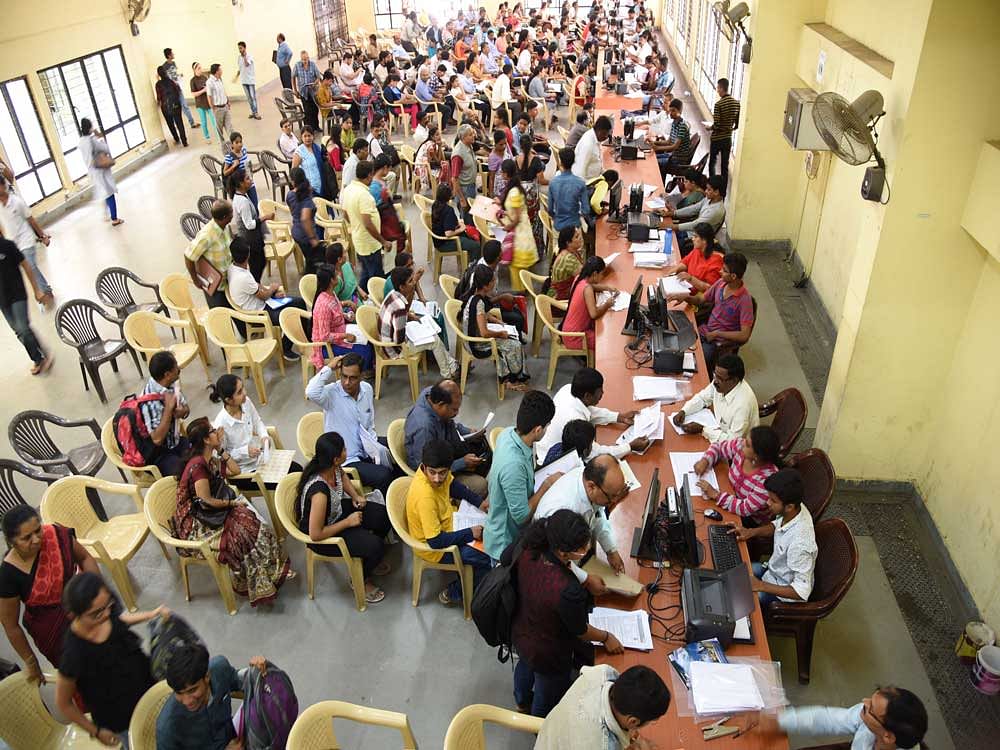 Several students and parents gathered at the office of the Karnataka Examinations Authority (KEA) to clarify queries. DH file photo