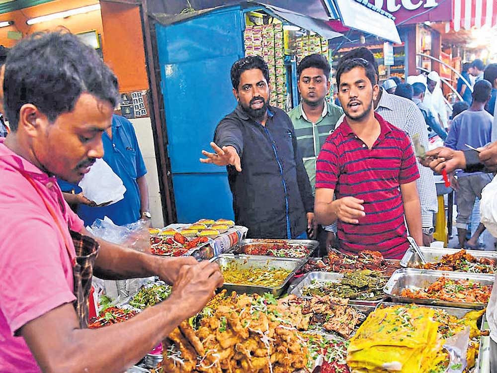 Stalls selling Ramzan delicacies in Shivajinagar.  DH PHOTOS BY KISHOR KUMAR BOLAR.