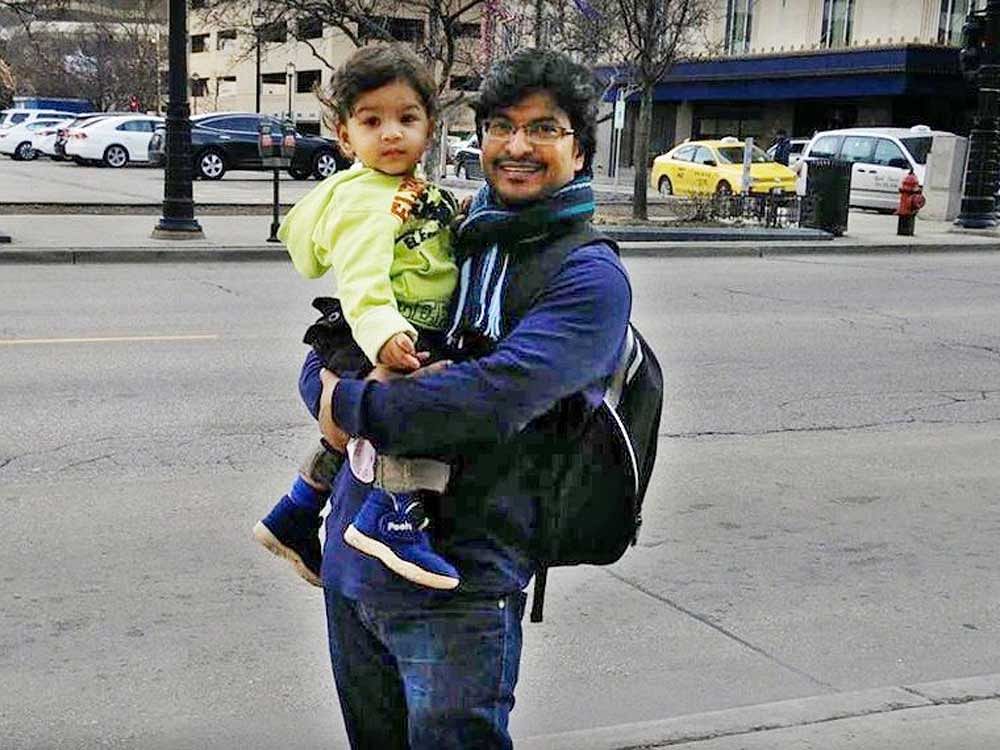 Nagaraju Surepalli and his 3 year old son Anant Sai. File Photo
