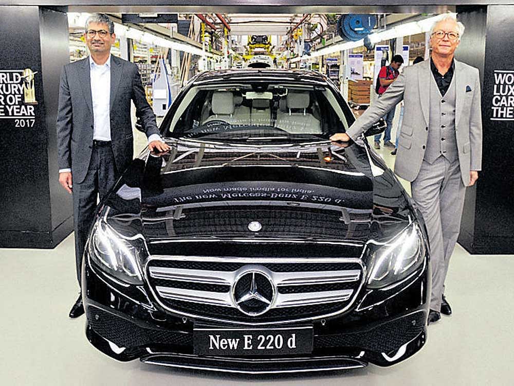 Roland Folger, MD & CEO, Mercedes-Benz (R), and Piyush Arora, Executive Director-Operations, Mercedes-Benz India, at the roll out of  E-Class 220 d, in Chakan.