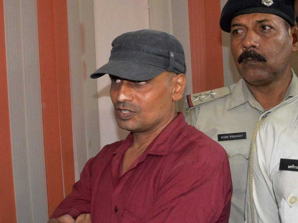 Patna police arrest 'topper' Ganesh Kumar on Friday. PTI