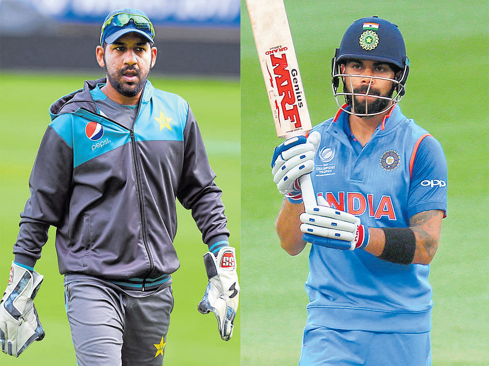 foes forever: Pakistan captain Sarfraz Ahmed (left) and Indian skipper Virat Kohli will look to raise their games on Sunday. AFP