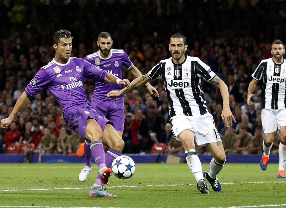 Real Madrid's Cristiano Ronaldo scores their third goal. Reuters