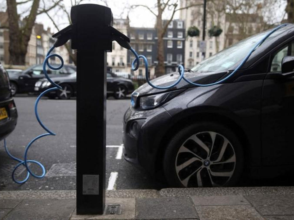 The new technology will do away with the need to stop and recharge an electric car's battery, and dramatically reduce the need for new infrastructure to support recharging stations, researchers said. Reuters image for courtesy.