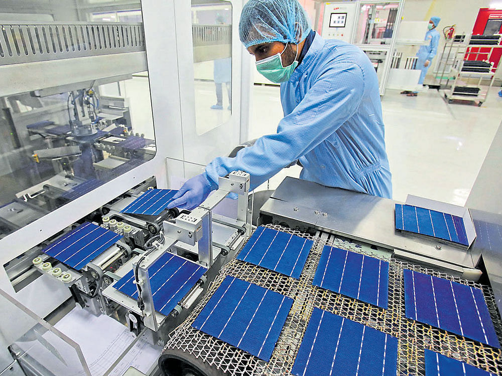 energised shift: A solar cell production line at Jupiter Solar Power Limited plant in Baddi, Himachal Pradesh. Experts say that India has no need of any new coal-fired plants for at least a decade, and it may be able to rely on renewable sources for all its future power needs. NYT
