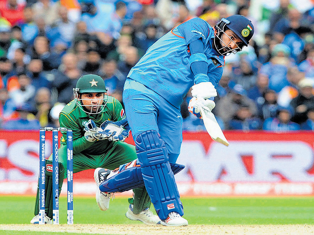Punishing mood: Yuvraj Singh was at his vintage best stroking a 32-ball 53 and taking the game away from Pakistan. AP/PTI