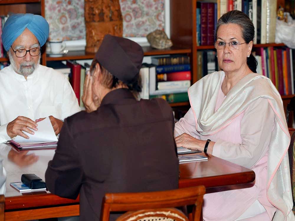 ormer Prime Minister Manmohan Singh, Congress president Sonia Gandhi and other leaders during the Congress Working Committee (CWC) Meeting at 10 Janpath in New Delhi on Tuesday. PTI Photo