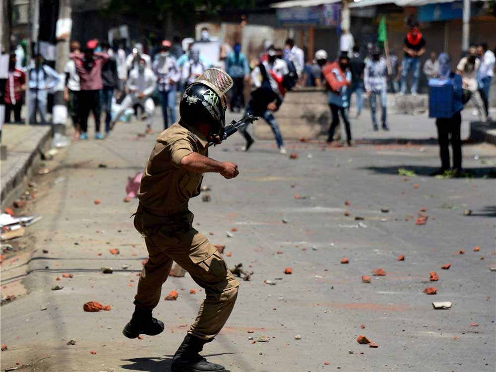 Civilian killed as forces  open fire on protesters