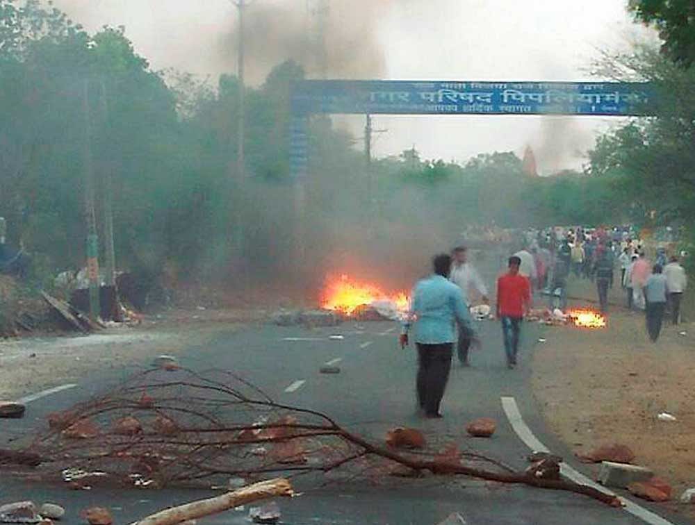 Farmers in large numbers blocked a road today in Berkheda Panth area, around 18 km from here. PTI file photo