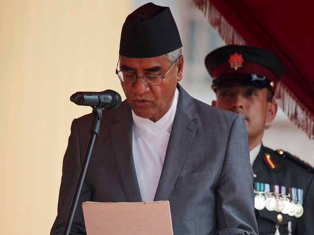 Nepal's newly elected prime minister Sher Bahadur Deuba, takes oath at the Presidential building in Kathmandu, Nepal, Wednesday, June 7, 2017. Nepal's parliament elected the veteran politician on Tuesday as the country's 10th prime minister in 11 years. It is the fourth time that Sher Bahadur Deuba has been prime minister of the Himalayan nation.  AP/PTI Photo