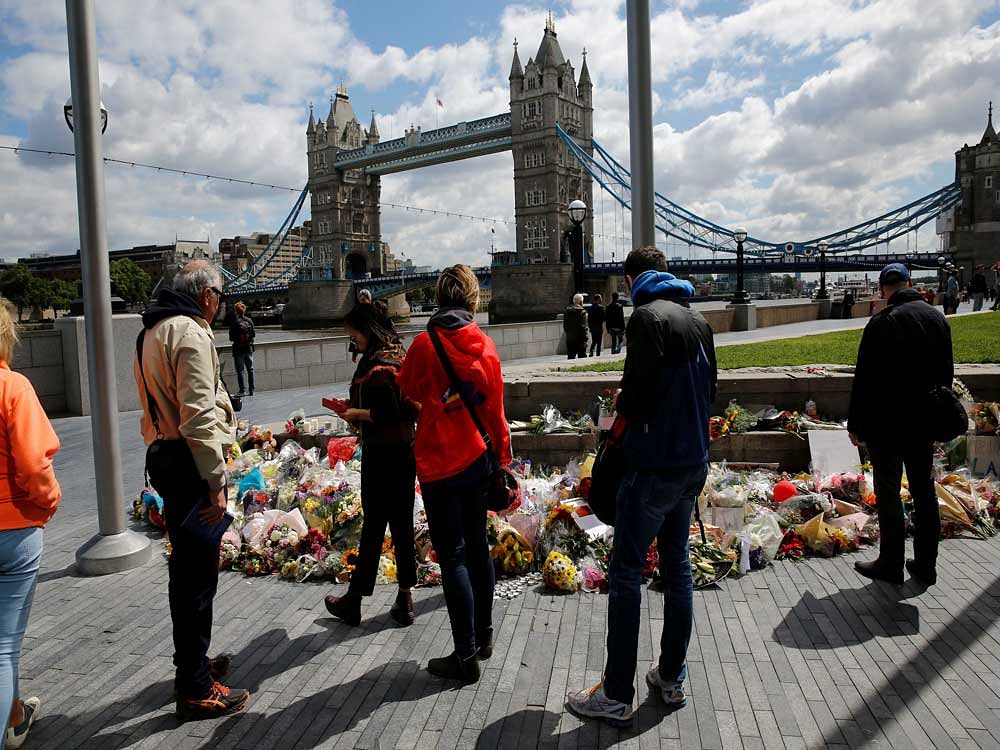 Floral tributes are seen near the scene of the recent attack at London Bridge and Borough Market in central London. Reuters Photo