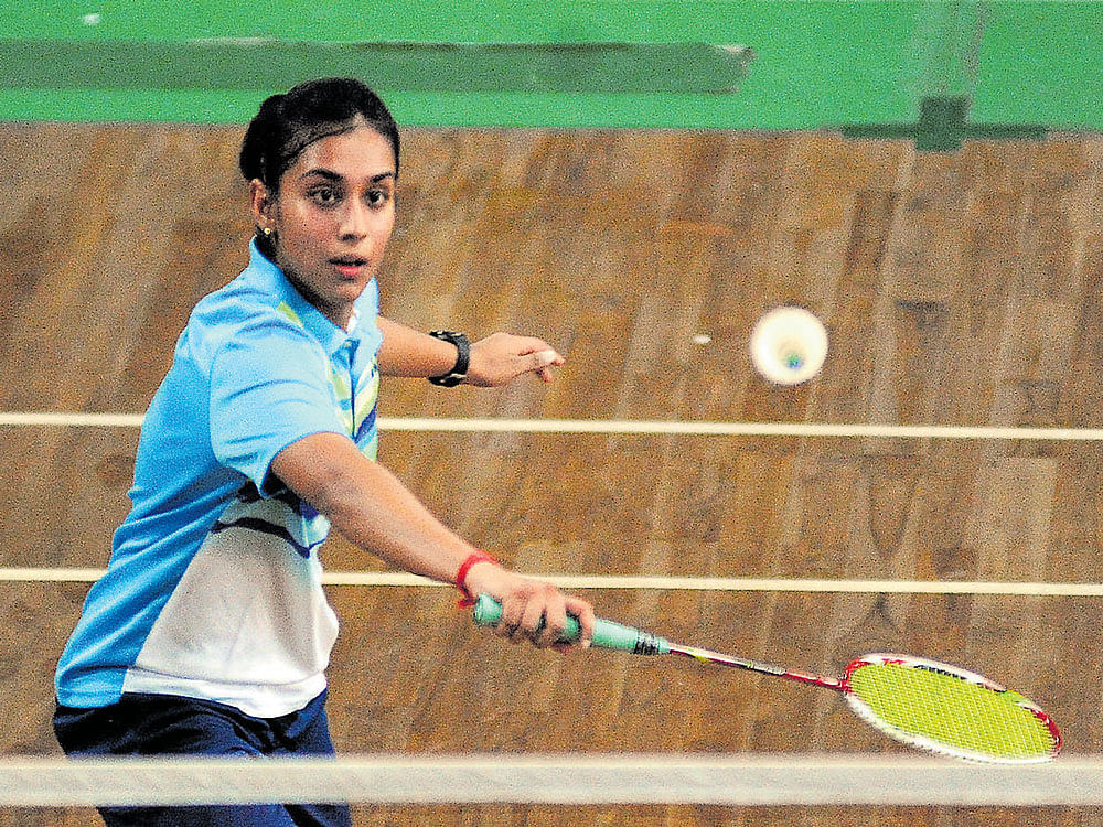 Deft: Drithi Yatheesh of Prakash Padukone Badminton Academy en route to her victory over Tanya Hemanth in the girls' under-17 singles quarterfinal on Thursday. DH photo.