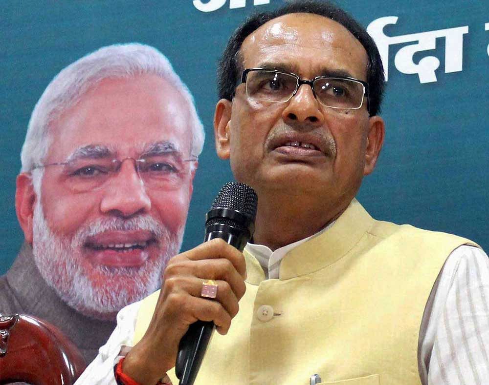 Madhya Pradesh Chief Minister Shivraj Singh Chouhan addressing a press conference on farmers issue at his residence in Bhopal on Friday. PTI Photo