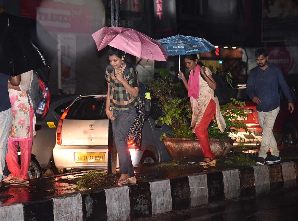 Trapped in a downpour, most Bengalureans find cabs disappear from their mobile apps. Desperate to head home,  their commute woes skyrocket as autorickshaw drivers overcharge and buses get stuck in floods.