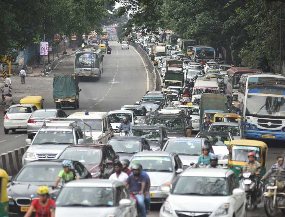 While the on-demand transport and ride-sharing help reduce traffic congestion, it is still too expensive for somebody to rely on cab aggregators. DH File photo