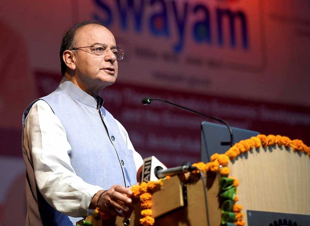 Union Minister for Finance and Corporate Affairs Arun Jaitley addresses during the inauguration of Teachers' Workshop at IIT in New Delhi on Sunday. PTI Photo