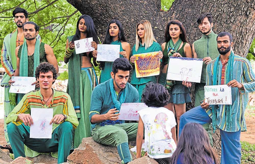 Models participate in 'Celebrate, Create, Cry', a rally to save trees on the premises of the government veterinary hospital on Queen's Road on Sunday. dh Photo