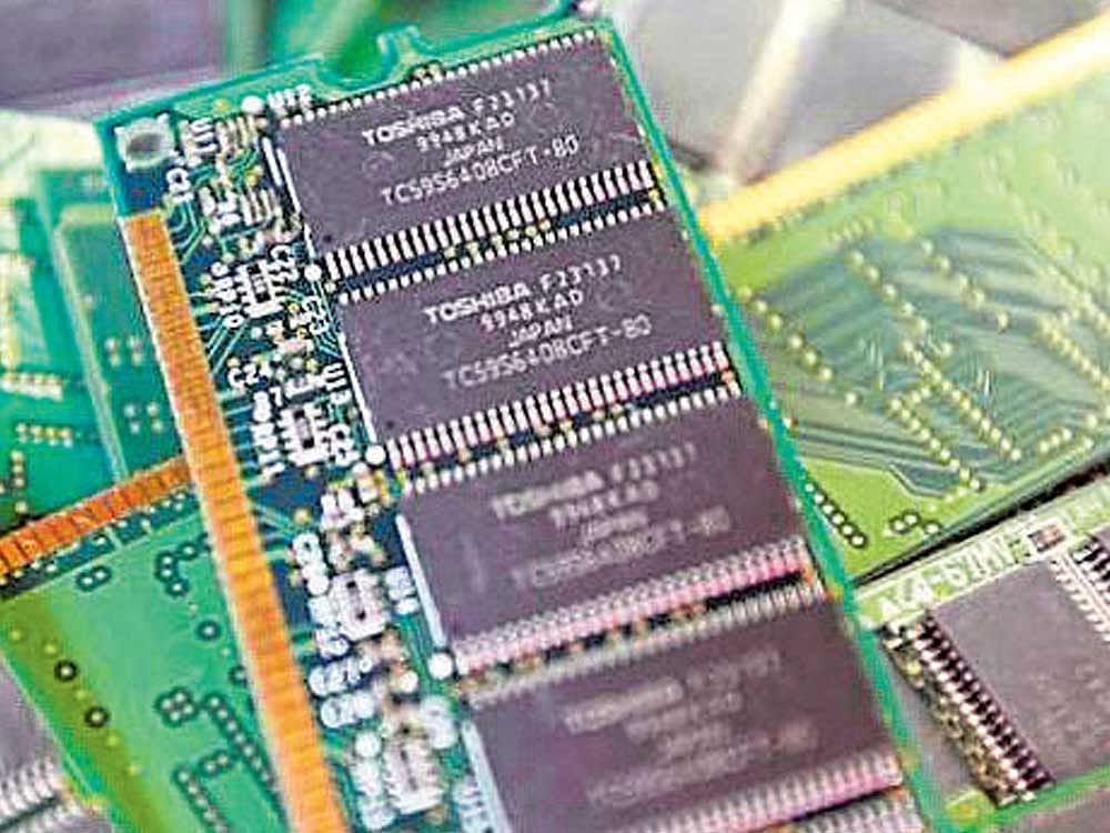 Toshiba's used-memory chips are seen at an electronics shop in Tokyo. reuters