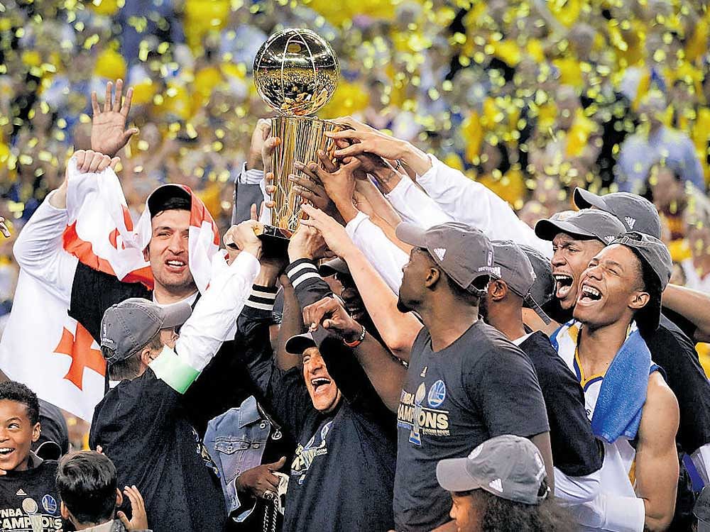champs again: The Golden State Warriors celebrate their triumph in the NBA Finals. AFP