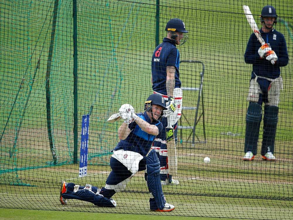 England's Eoin Morgan, Ben Stokes and Jos Buttler during nets Action Images via Reuters