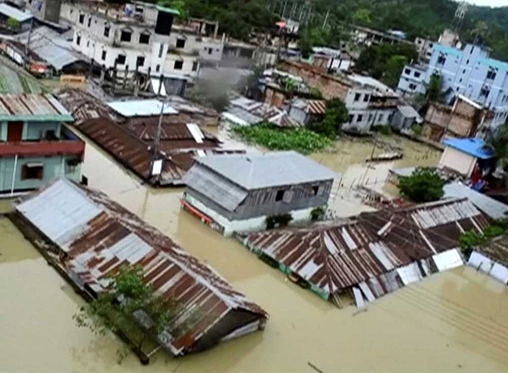 An aerial view showing the town half-submerged in floodwaters following landslides triggered by heavy rain in Khagrachari, Bangladesh, in this still frame taken from video June 13, 2017. REUTERS