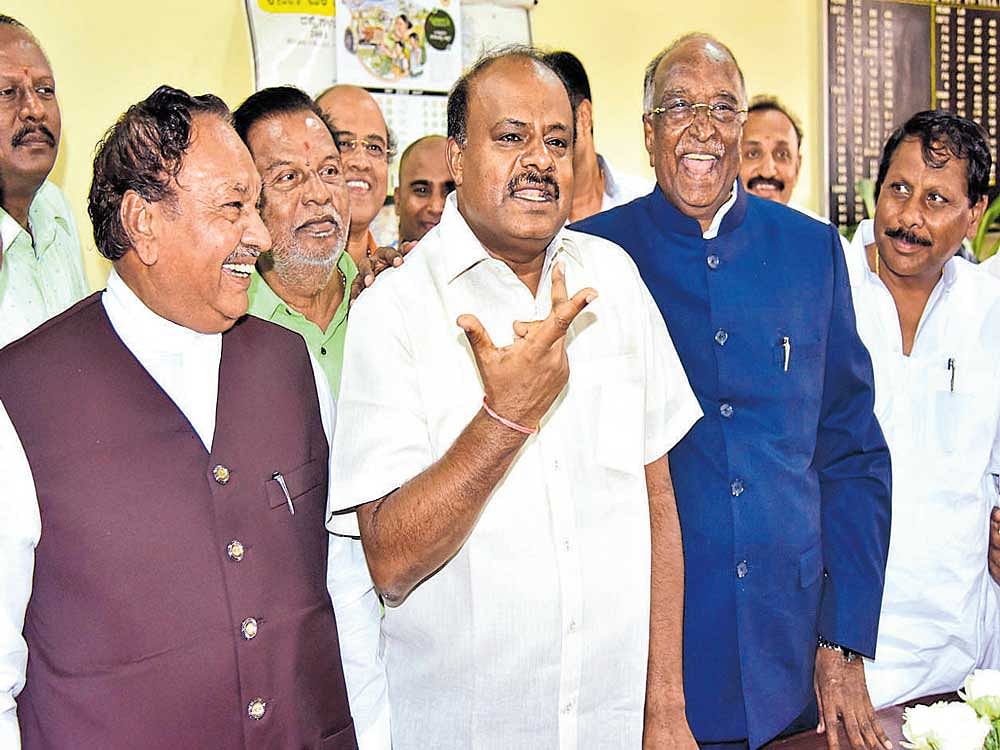Leader of the Opposition in the Legislative Council K&#8200;S&#8200;Eshwarappa, state JD(S)&#8200;president  H&#8200;D&#8200;Kumaraswamy and Council Chairman D&#8200;H&#8200;Shankaramurthy in a happy mood after the Congress' resolution to unseat Shankaramurthy was defeated in the Upper House on Thursday. DH&#8200;Photo