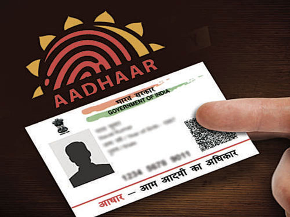 The government in Budget 2017 has already mandated seeding of Aadhaar number with Permanent Account Number to avoid individuals using multiple PANs to evade taxes. File photo