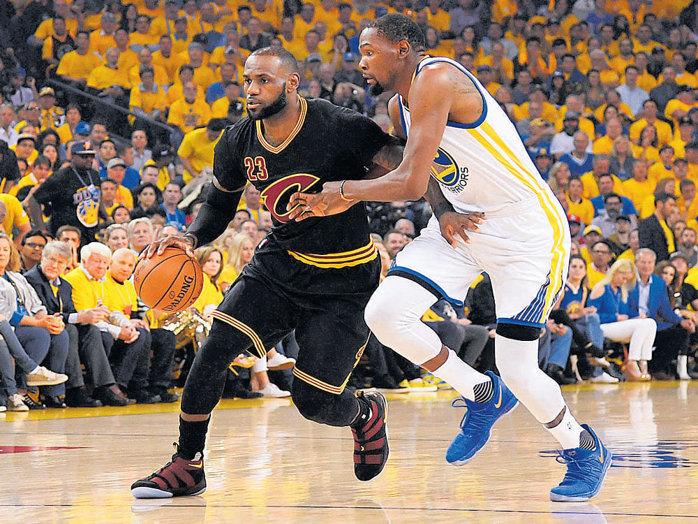 Cavaliers' LeBron James (left) had to settle for second spot behind Golden State Warriors' Kevin Durant. Reuters