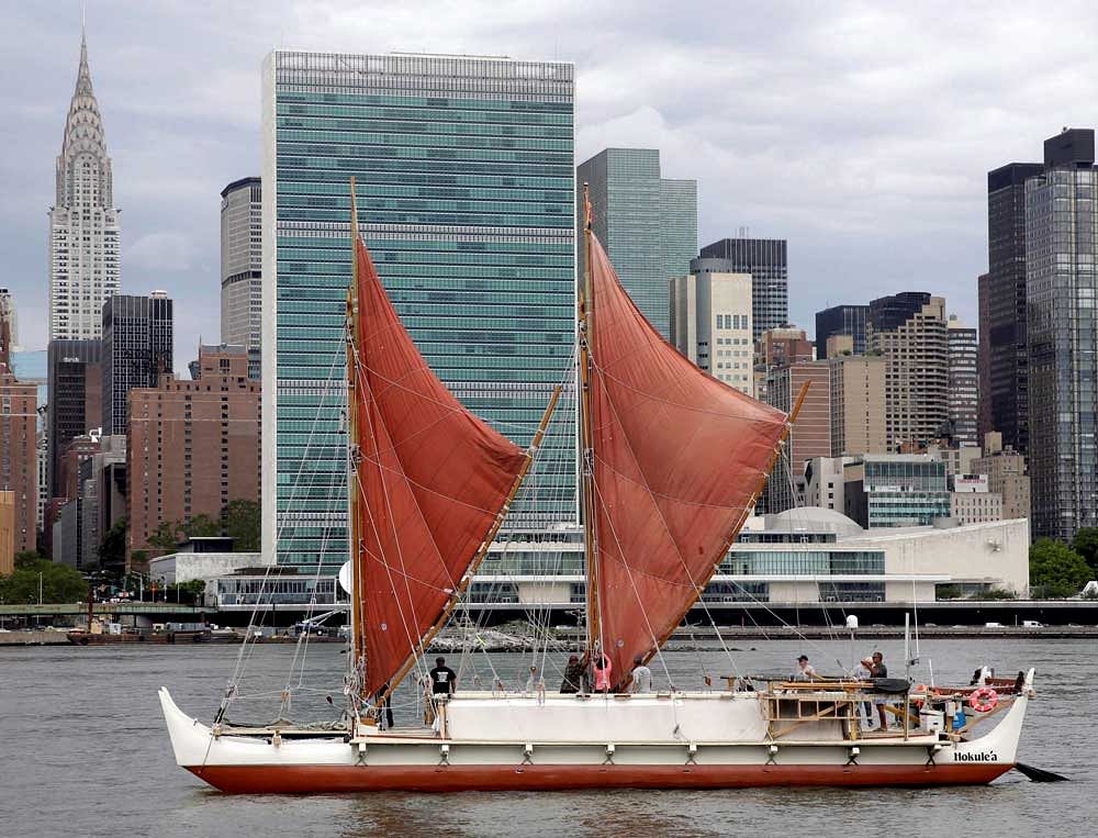 In this June 8, 2016, file photo, the traditional Polynesian voyaging canoe Hokulea, on an around-the-world journey, sails by the United Nations on New York's East River, during the World Oceans Day observance. The Polynesian voyaging canoe is returning to Hawaii after a three-year journey around the world guided only by nature with navigators using no modern navigation to guide Hokulea across 40,000 nautical miles to 19 countries.Thousands are expected to welcome the double-hulled canoe to Oahu, Hawaii, on Saturday, June 17, 2017. AP/PTI