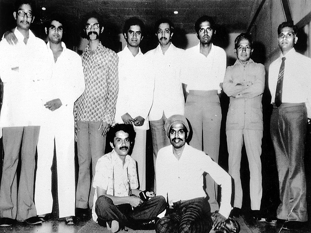 (Standing, from left) V Hariram, the author, S Shanthakumar, C Chandrasekhar, Virupaksha, D S Nagaraj, Srinivas and S B Bhagwan. (Sitting) P Ravindranath Powar and D C Krishnamurthy.