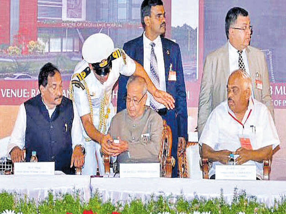 President Pranab Mukherjee lays the foundation stone for a hospital in Udupi on Sunday.