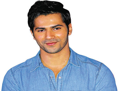 Varun Dhawan is set to recreate the magic of hit song 'Oonchi Hai Building' from the film 'Judwaa.' PTI Photo