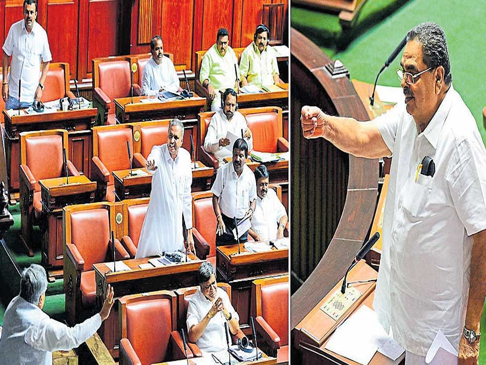 Speaker K&#8200;B&#8200;Koliwad intervenes as BJP&#8200;members Vishweshwara Hegde Kageri and  others raise their voice in the Legislative Assembly on Monday, seeking the dismissal of  Forest Minister B Ramanath Rai (right) from the Cabinet. DH&#8200;Photo