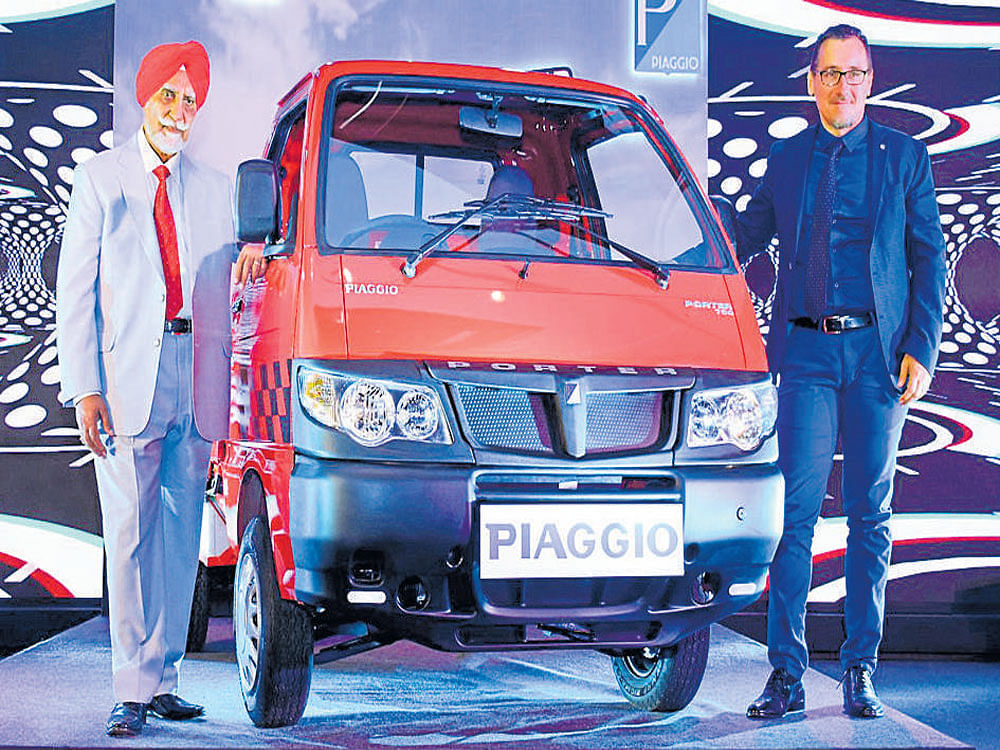 Ravi Chopra (left) and Diego Graffi unveil Piaggio's trusty Porter 700 in India, aimed to cater to the goods transportation and commercial segments.
