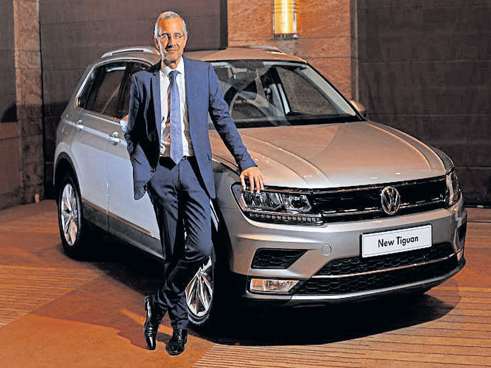 Thierry Lespiaucq shows off the latest SUV offering from German automaker Volkswagen - the Tiguan.
