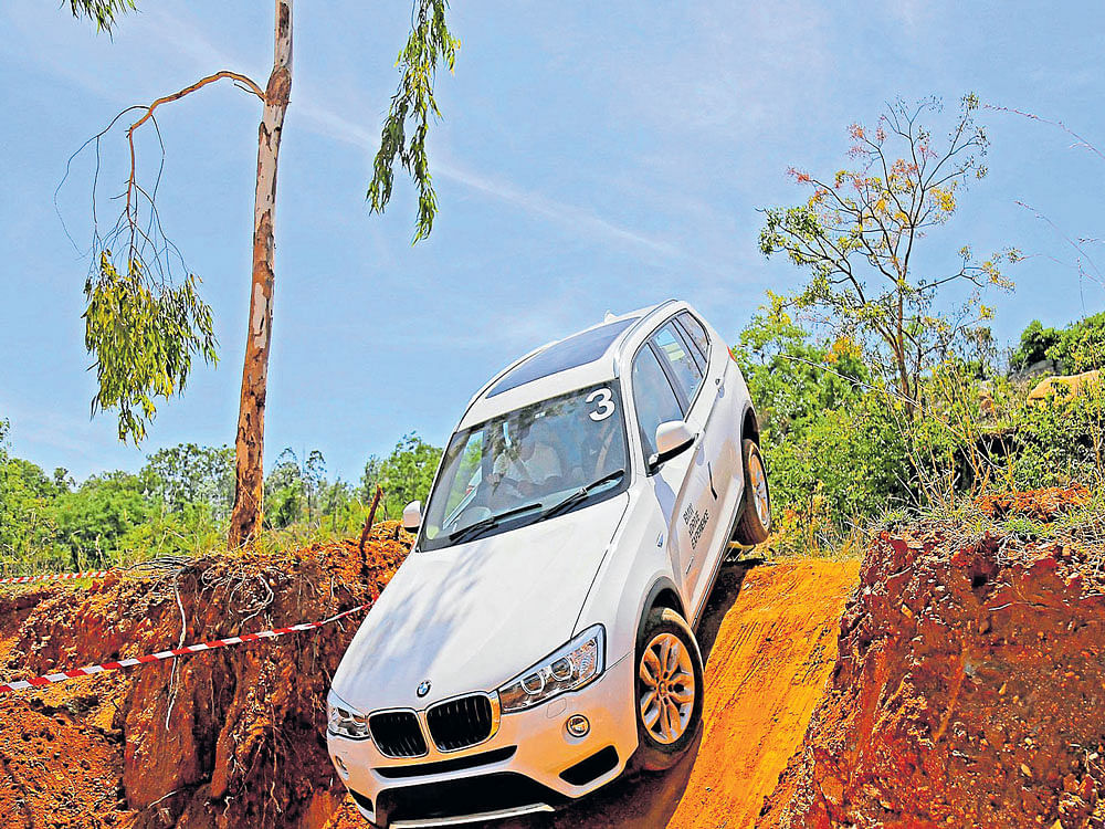 Taming terrain: The BMW&#8200;X3's entry into challenging  landscapes is quite effortless.
