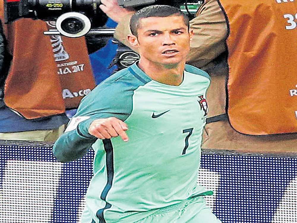 Portugal's Cristiano Ronaldo celebrates  after scoring against Russia in Moscow on Wednesday. AFP