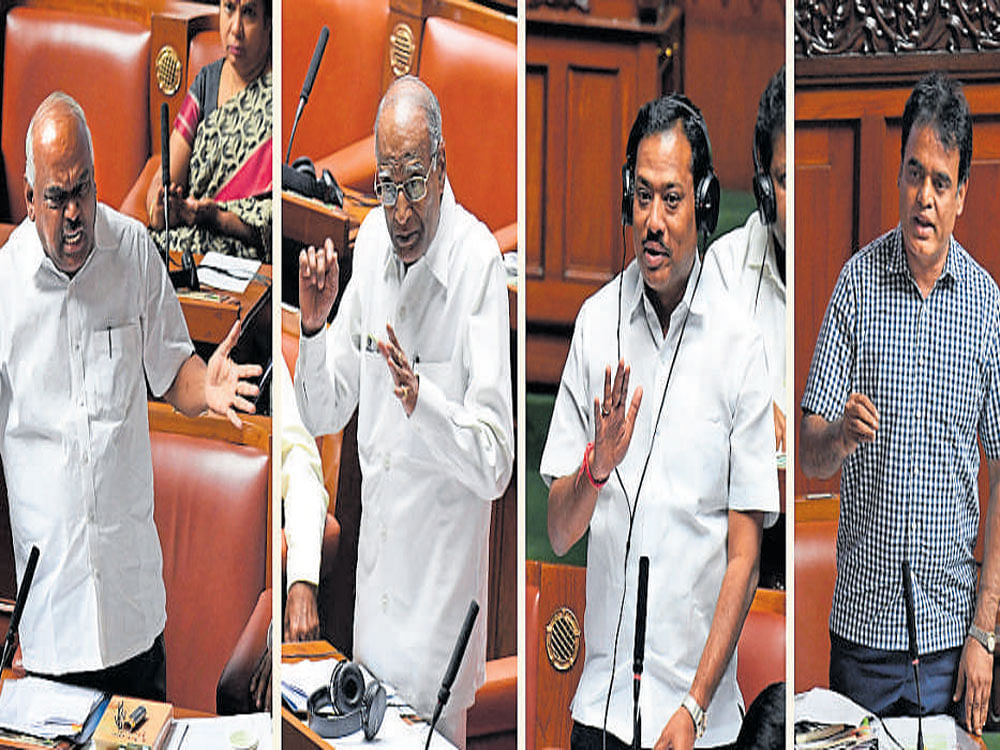 Health Minister K&#8200;R&#8200;Ramesh Kumar tables the Amendment Bill to Karnataka Private Medical Establishment Act, 2007,  as MLAs who are also doctors A B Maalakaraddy, Shivaraj Patil and C N Ashwath Narayan speak on it in the Assembly on Tuesday. DH photo