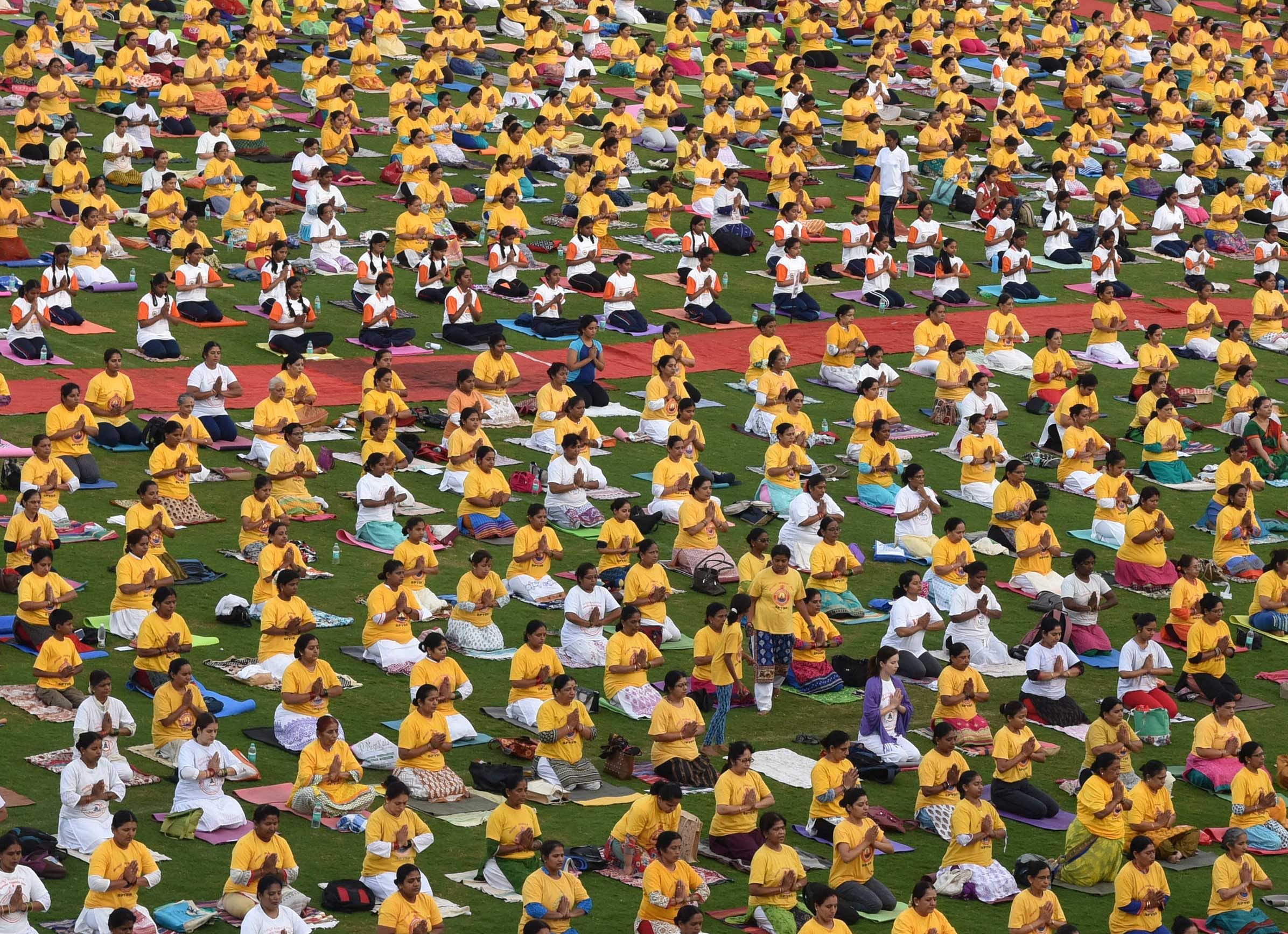 People from across the world joined in on the third International Yoga Day. file photo.