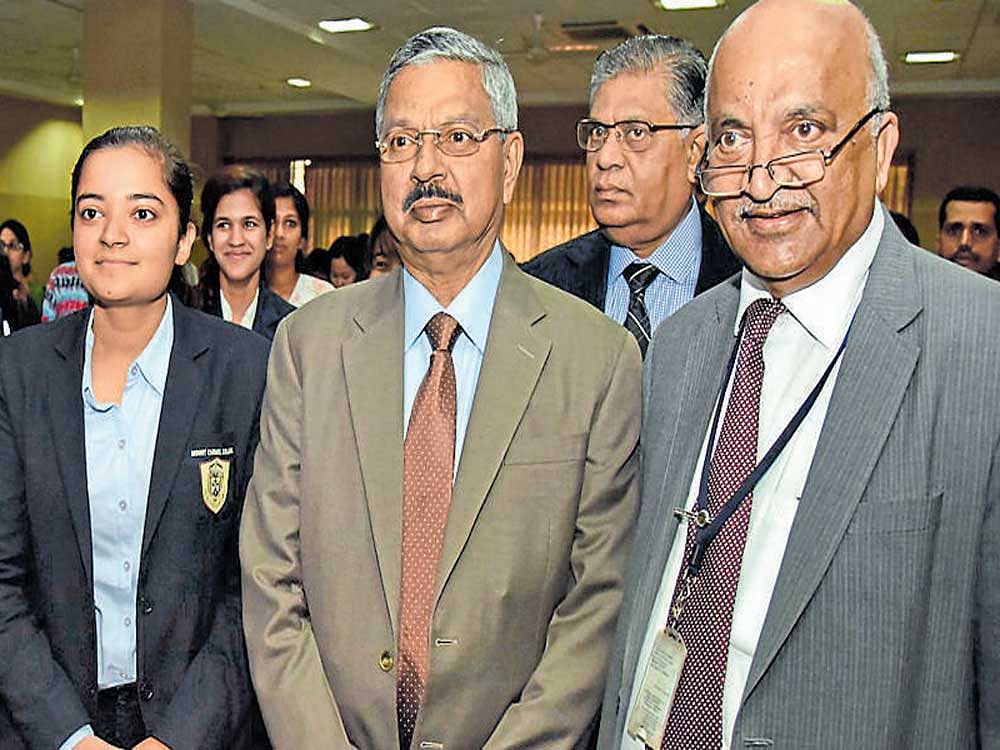 National Law School of India University (NLSIU) Vice Chancellor R Venkata Rao, National  Human Rights Commission (NHRC) Chairperson and former Chief Justice of India Justice (retd)  H L Dattu and NHRC member D Murugesan at the inauguration of the workshop on 'The Role of Media in Promotion and Protection of Human Rights' at the NLSIU in Bengaluru on  Thursday. dh Photo