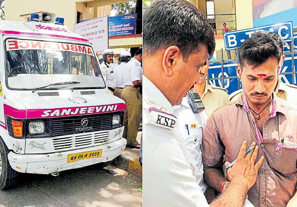 Halasuru gate traffic police arrest driver Kantharaj for drunk-driving on Thursday. DH PHOTOS