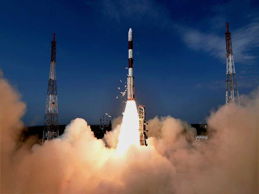 Indian Space Research Organisation (ISRO)'s PSLV C38, carrying earth observation satellite Cartosat-2 Series and 30 co-passenger satellites of various countries, lifts off from Satish Dhawan Space Center in Sriharikota on Friday. PTI Photo
