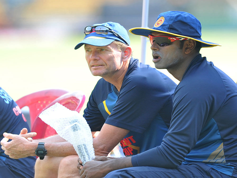 Graham Ford (L) quit as Sri Lanka's coach, two weeks after the team bowed out of the Champions Trophy. file photo.