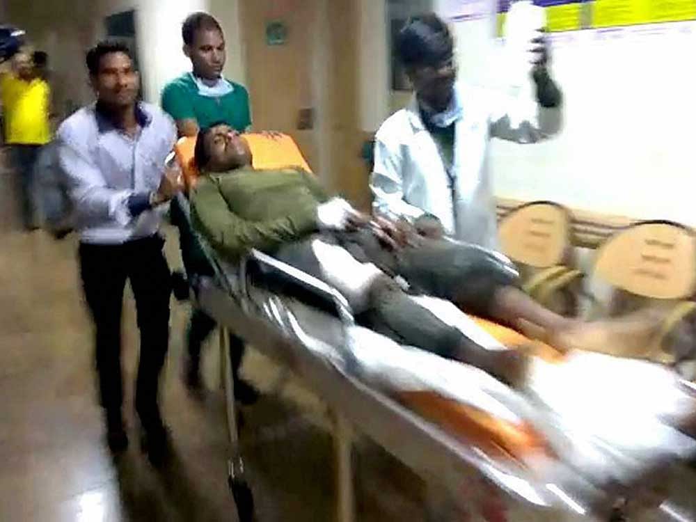 A jawan is being taken to a hospital after maoist attack in Sukma, Chhattisgarh on Saturday. At least two security personnel were killed and three injured. PTI Photo