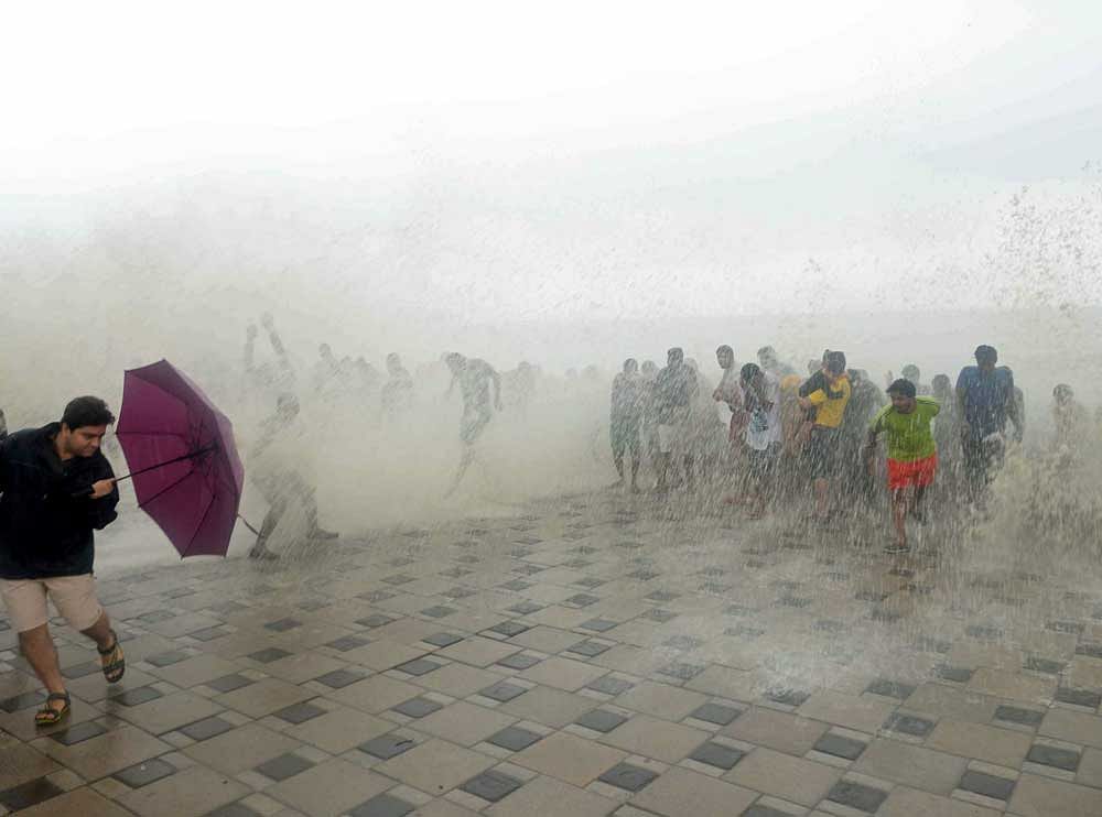 The inundated Dadar Chowpatty during the high tide on Sunday afternoon. DH Photo