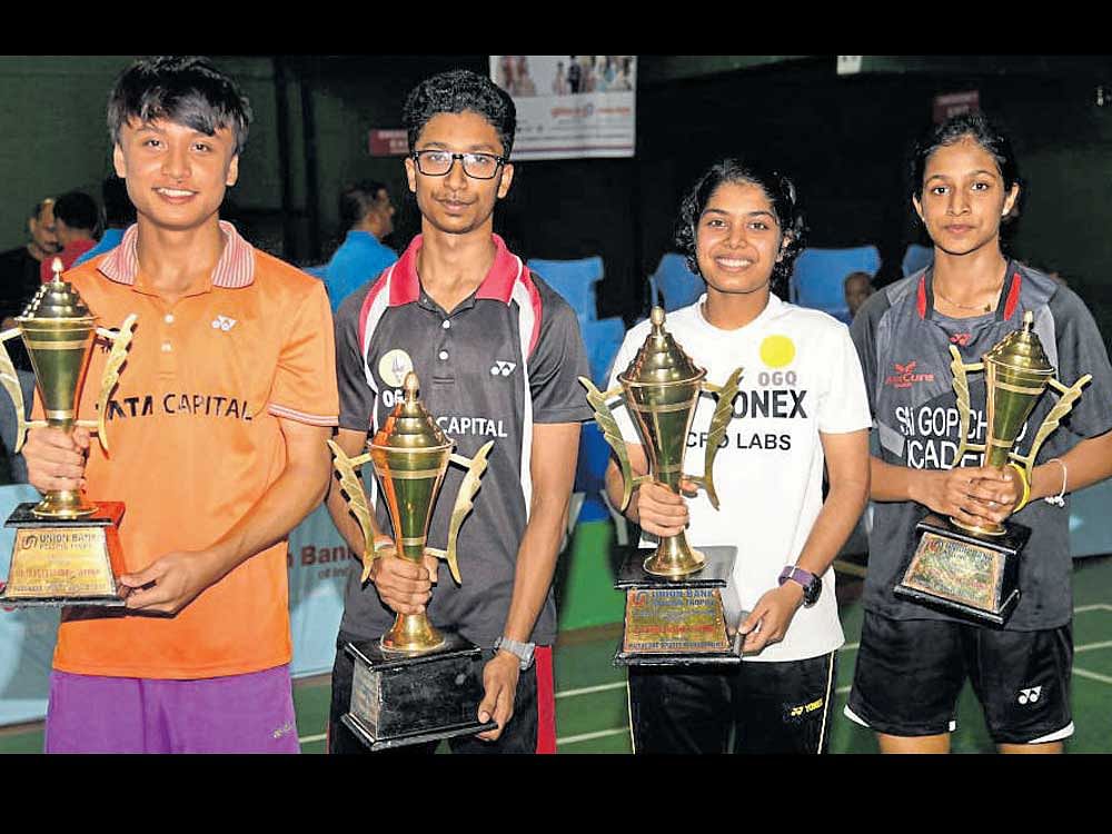 Winners at the 16th Union Bank all-India junior ranking badminton meet on Sunday. (From left) Maisnam Meraba (boys' U-17), Rahul Bhardhvaj (boys' U-19), Aakarshi Kashyap (girls' U-19) and Gayatri GP (girls' U-17). DH PHOTO