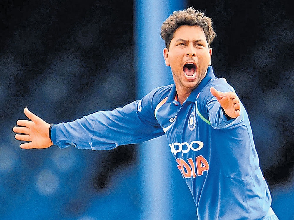 wristy customer: India's Kuldeep Yadav shone in just his second ODI, scalping 3/50 against the West Indies. AFP