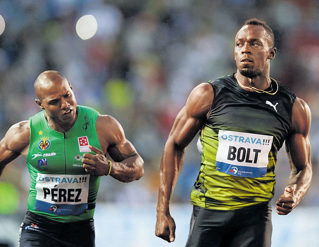 Jamaica's Usain Bolt (right) geared up for August's World Championships with a fine win at the Ostrava Golden Spike meeting on Wednesday. Reuters