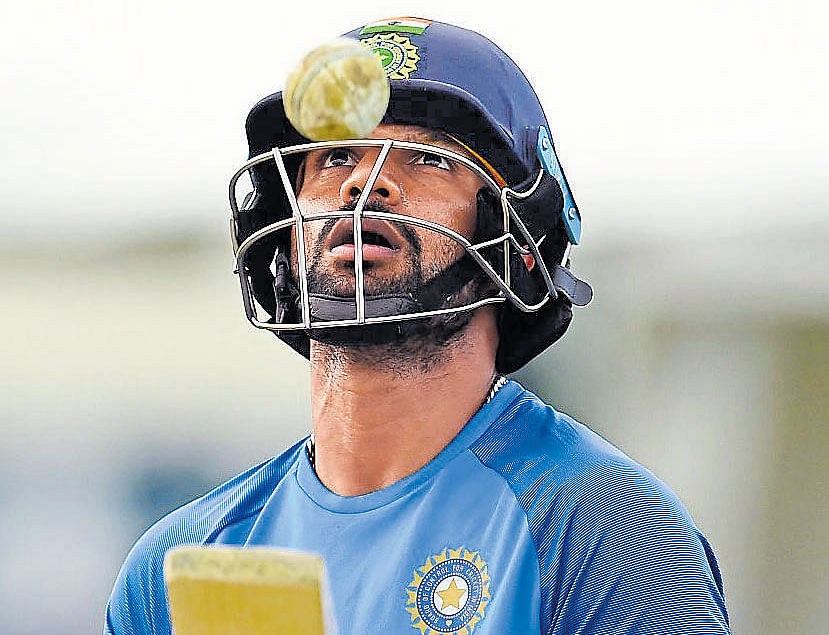 In-from India opener Shikhar Dhawan during a practice session at North Sound, Antigua on Thursday. AFP